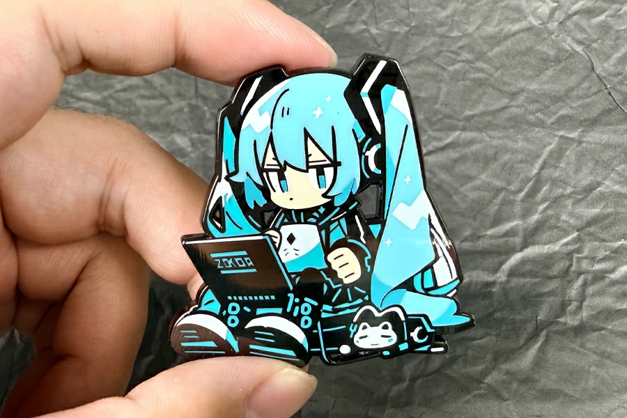 Blue Hatsune Miku and kitten play electric badges