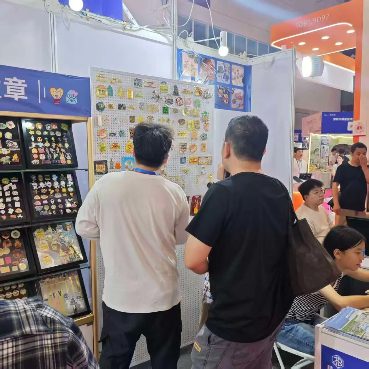 Customer viewing custom products at exhibition